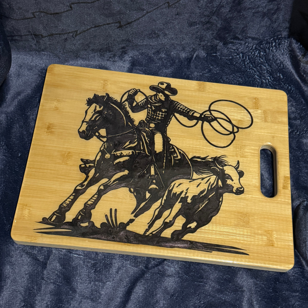 Cowboy horse cutting cow chopping board