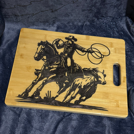 Cowboy horse cutting cow chopping board